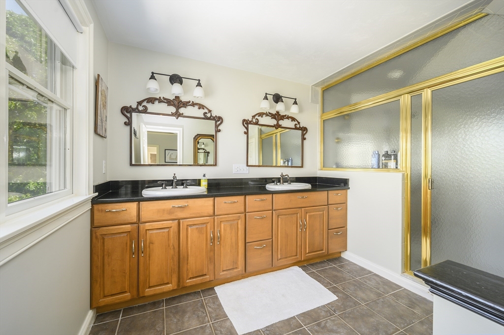 2 Daffodil Lane Barnstable, MA 02630 - Photo 34 of 42 a large bathroom with a granite countertop sink and a mirror