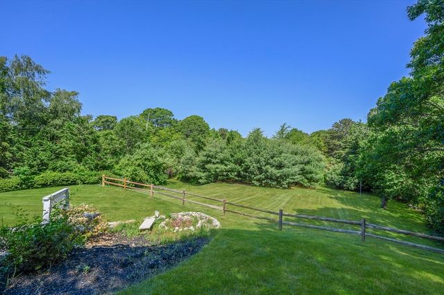 a view of a golf course with a lake