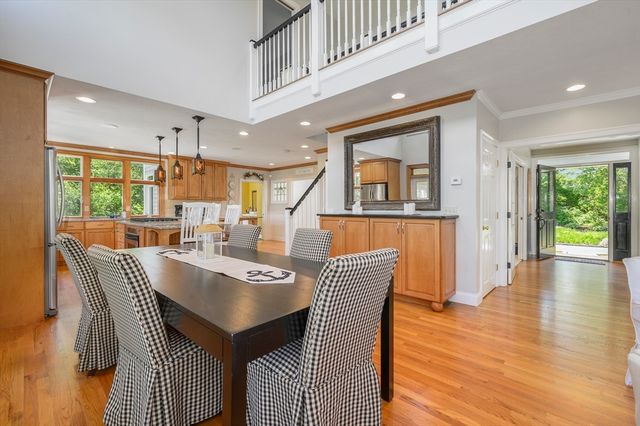 a dining room with furniture window wooden floor