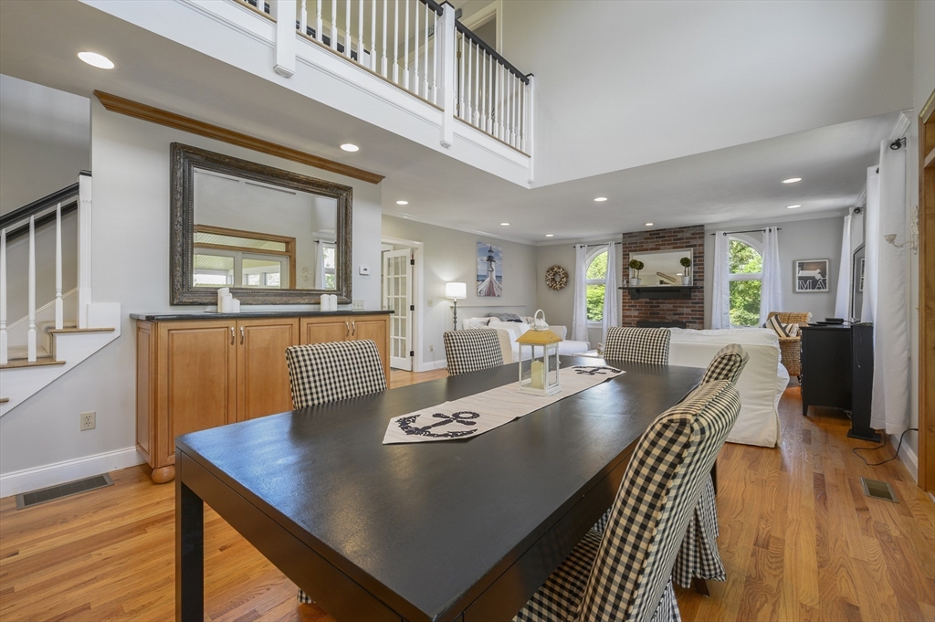 2 Daffodil Lane Barnstable, MA 02630 - Photo 9 of 42 a view of a dining room with furniture and wooden floor