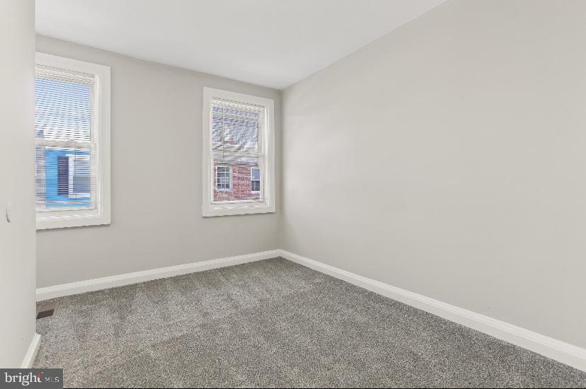 626 Archer Street Baltimore, MD 21230 - Photo 12 of 21 an empty room with windows