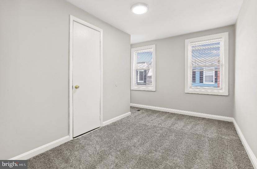626 Archer Street Baltimore, MD 21230 - Photo 13 of 21 an empty room with windows