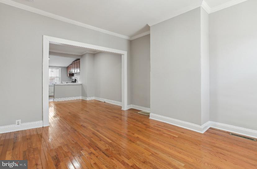 626 Archer Street Baltimore, MD 21230 - Photo 16 of 21 a view of empty room with wooden floor