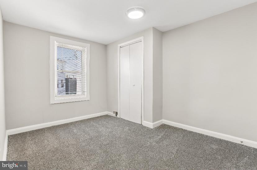 626 Archer Street Baltimore, MD 21230 - Photo 10 of 21 a view of an empty room with a window