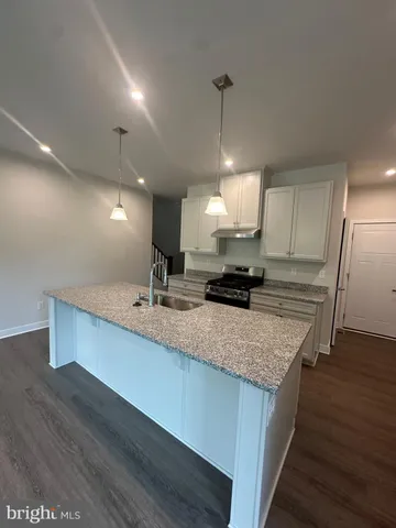 a view of empty room with windows