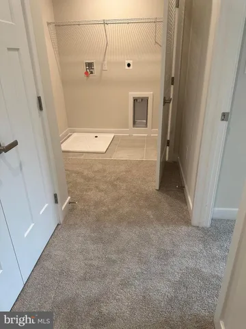 a bathroom with a toilet and a bathtub