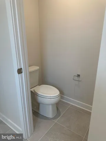 a utility room with a sink and a large window