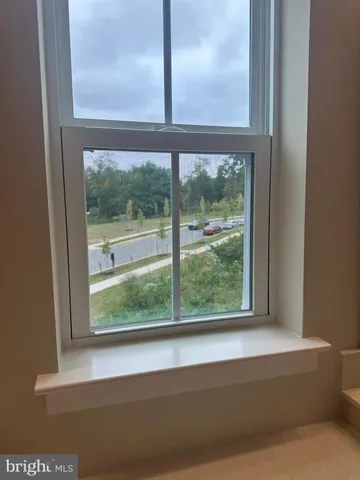 a bathroom with a sink a mirror and a shower