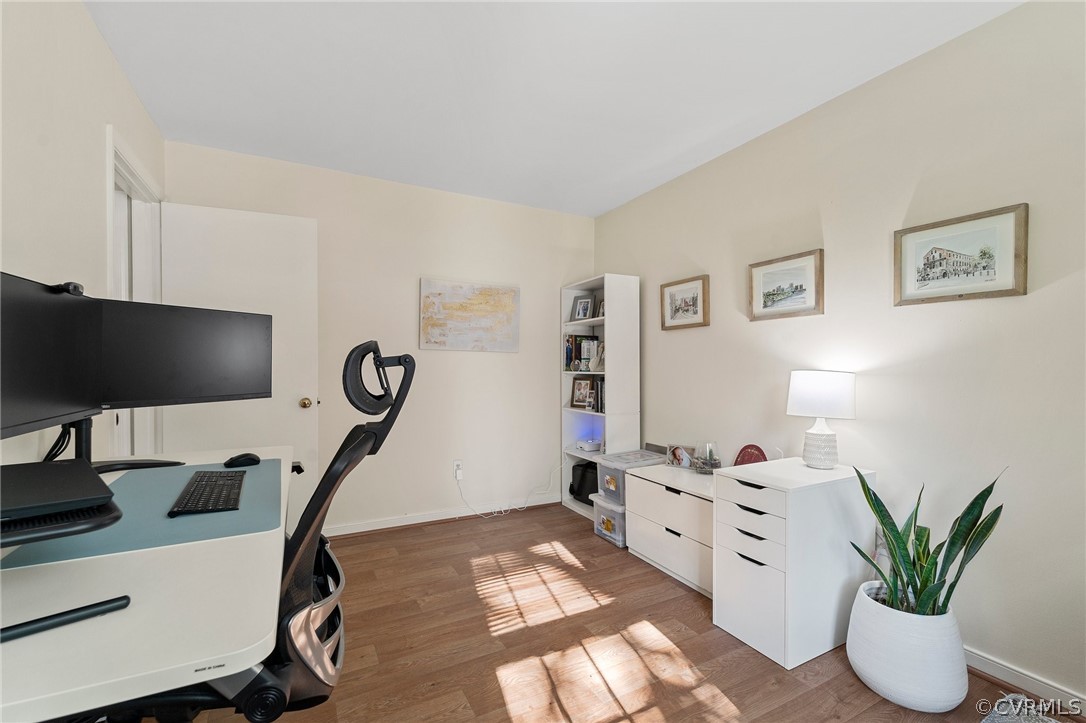 2304 Lashley Lane Henrico, VA 23238 - Photo 13 of 29 a view of a workspace with furniture and a flat screen tv