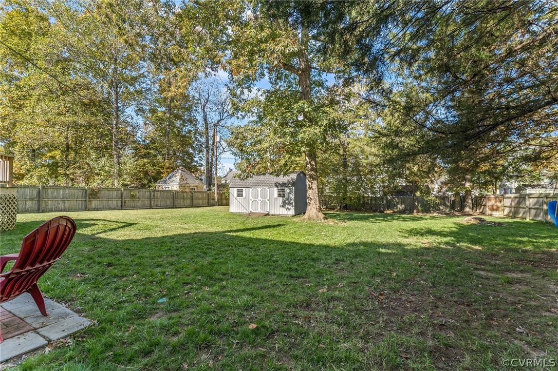2304 Lashley Lane Henrico, VA 23238 - Photo 24 of 29 a garden with trees in the background