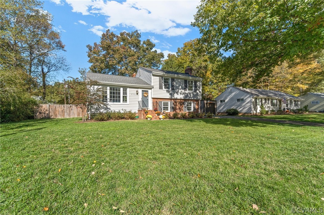 2304 Lashley Lane Henrico, VA 23238 - Photo 28 of 29 a view of a house with a big yard and large trees