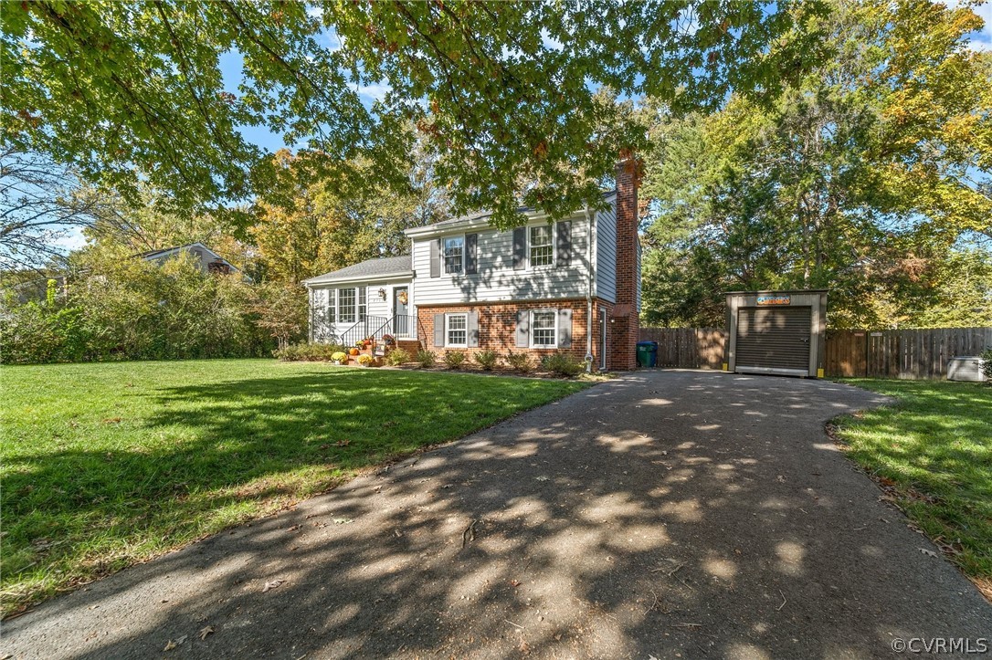 2304 Lashley Lane Henrico, VA 23238 - Photo 29 of 29 a view of a house with a yard