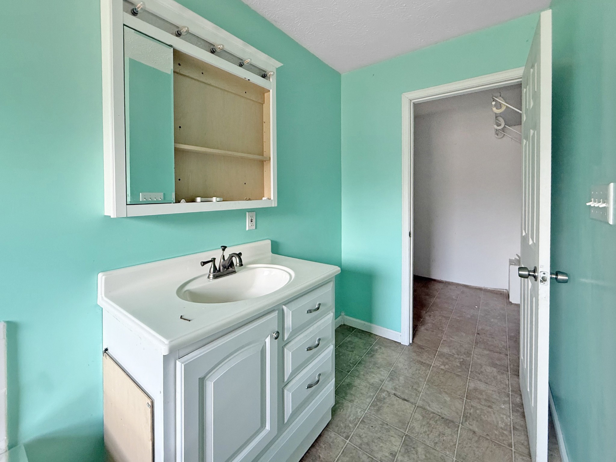 607 Cool Springs Road Morgantown, KY 42261 - Photo 11 of 18 a bathroom with a sink and a mirror