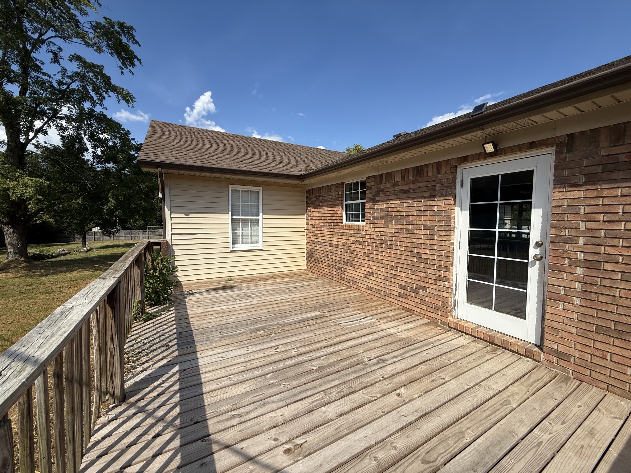 607 Cool Springs Road Morgantown, KY 42261 - Photo 17 of 18 a view of house with deck and wooden floor
