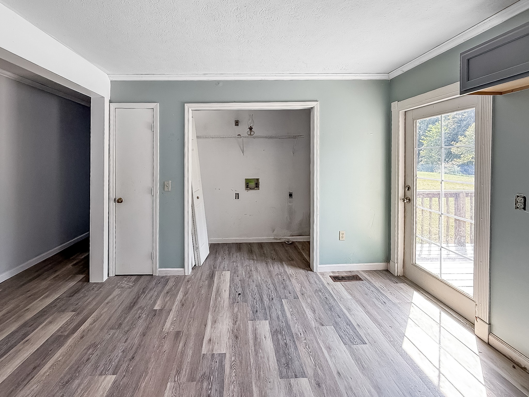 607 Cool Springs Road Morgantown, KY 42261 - Photo 7 of 18 a view of a room with wooden floor and window