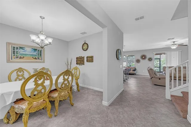 a view of living room filled with furniture and furniture