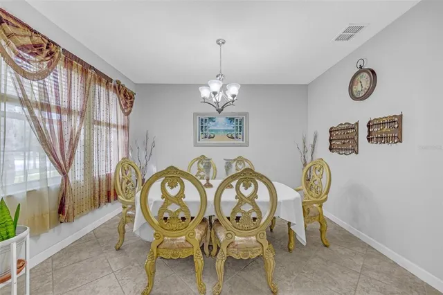 a view of a table and chairs in a room
