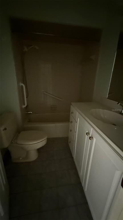 233 West Citrus Street Altamonte Springs, FL 32714 - Photo 11 of 19 a bathroom with a granite countertop toilet and a sink