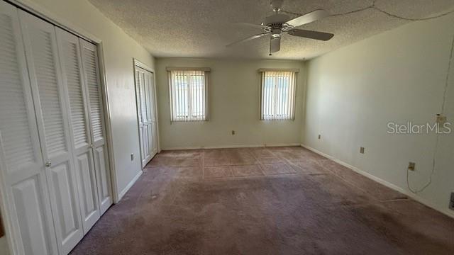 233 West Citrus Street Altamonte Springs, FL 32714 - Photo 13 of 19 an empty room with windows and fan