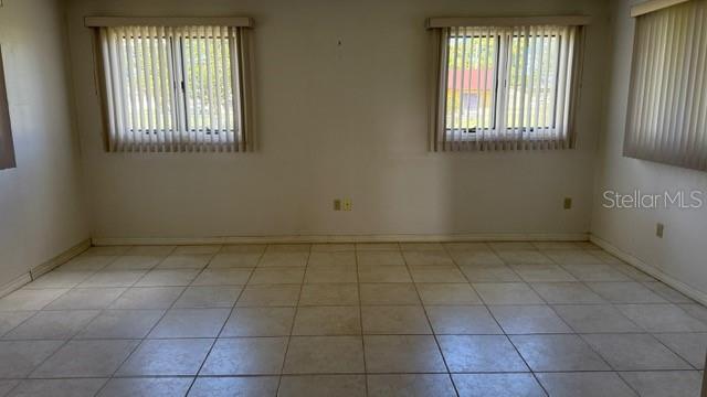 233 West Citrus Street Altamonte Springs, FL 32714 - Photo 6 of 19 an empty room with windows