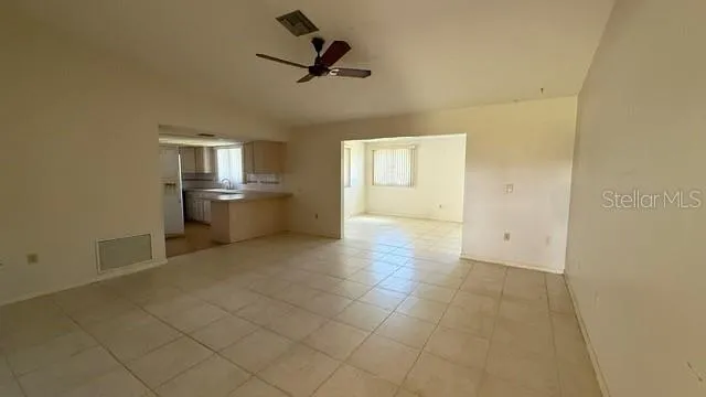 a view of a kitchen with a sink and dishwasher in kitchen