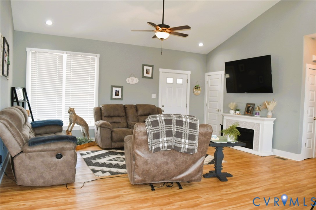 288 Moore Road Farmville, VA 23901 - Photo 11 of 33 a living room with furniture and a flat screen tv