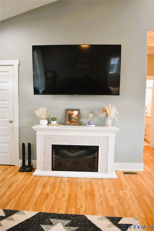 288 Moore Road Farmville, VA 23901 - Photo 14 of 33 a living room with a fireplace and a flat screen tv