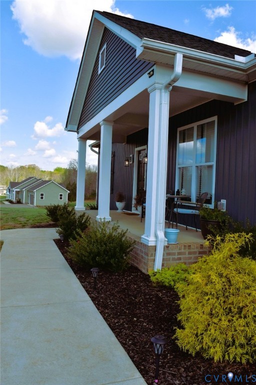 288 Moore Road Farmville, VA 23901 - Photo 7 of 33 a front view of a house with garden