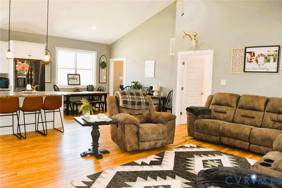 288 Moore Road Farmville, VA 23901 - Photo 9 of 33 a living room with furniture a floor to ceiling window and a table