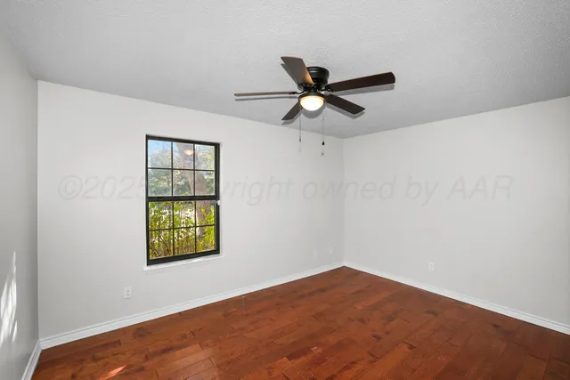 a view of a big room with carpet