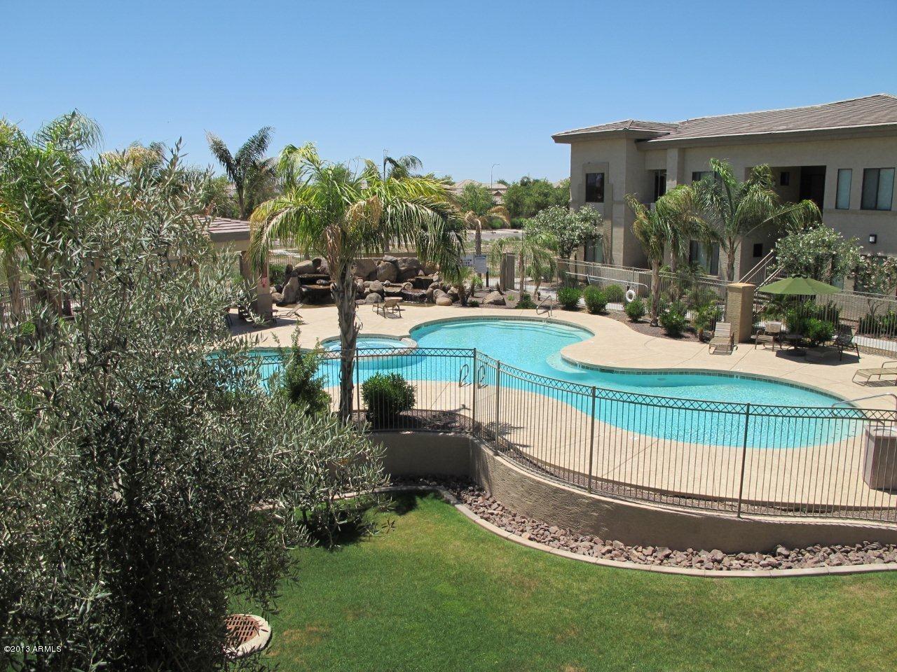 3330 South Gilbert Road, Unit 2014 Chandler, AZ 85286 - Photo 14 of 30 a view of a backyard with swimming pool