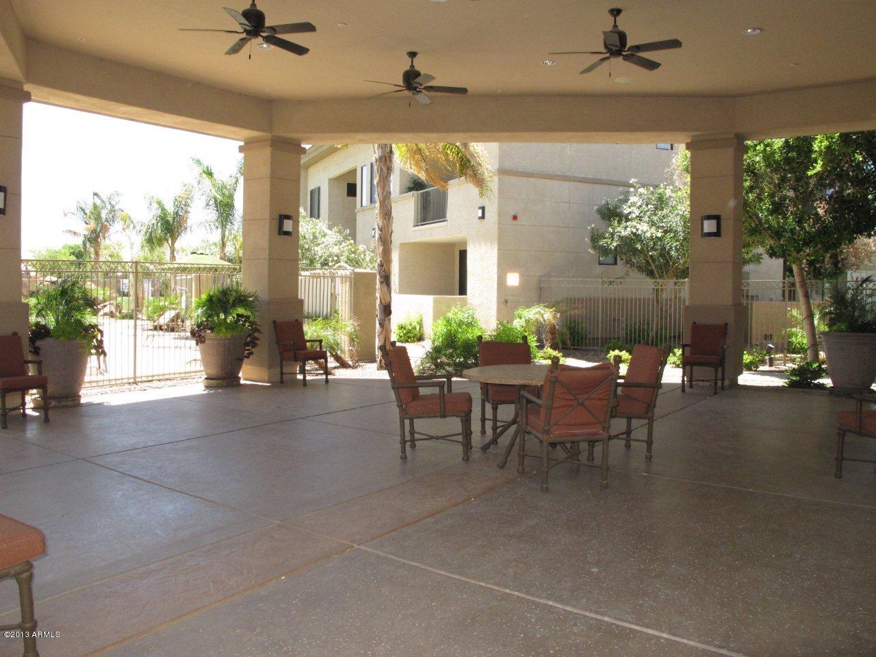 3330 South Gilbert Road, Unit 2014 Chandler, AZ 85286 - Photo 23 of 30 a view of a dining room with furniture window and outside view