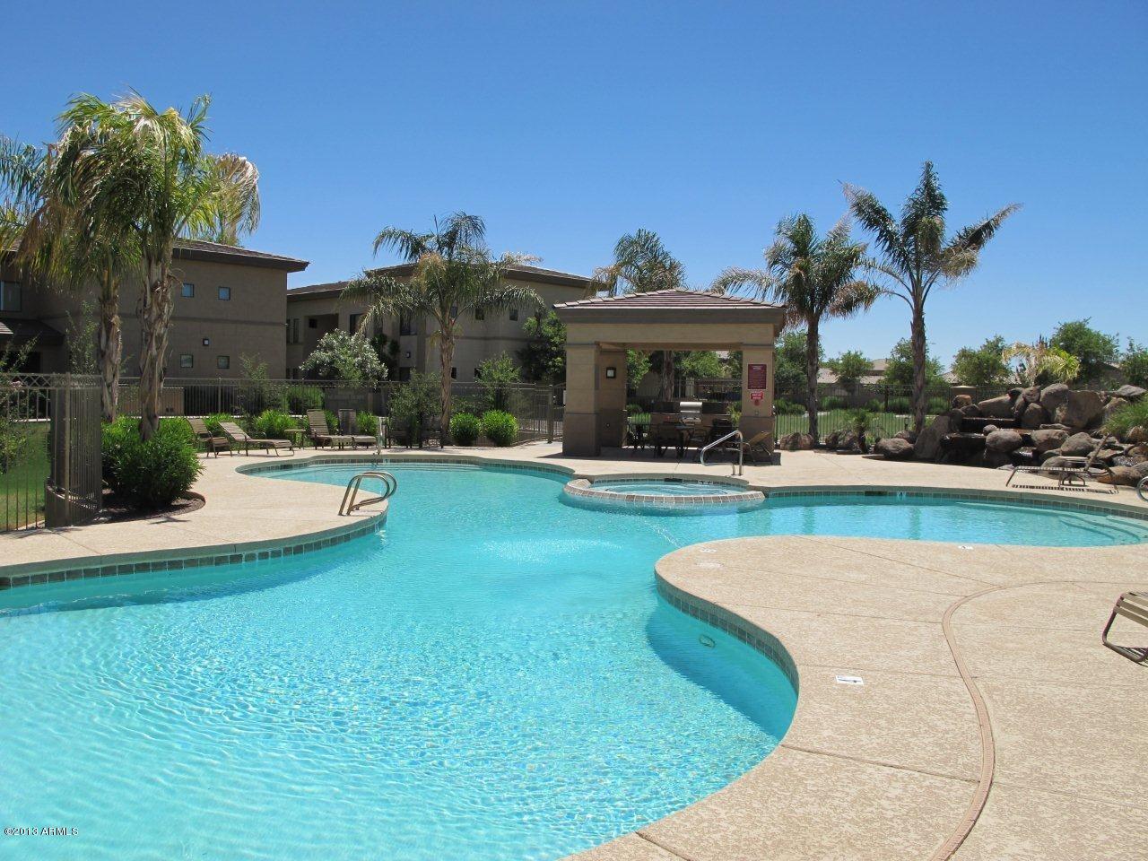 3330 South Gilbert Road, Unit 2014 Chandler, AZ 85286 - Photo 26 of 30 a view of a house with swimming pool