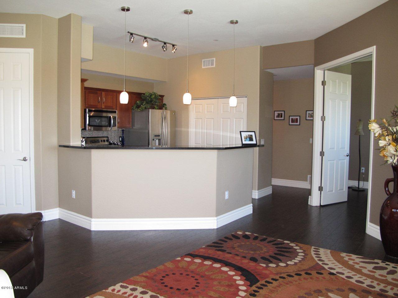 3330 South Gilbert Road, Unit 2014 Chandler, AZ 85286 - Photo 3 of 30 a view of a living room and a couch