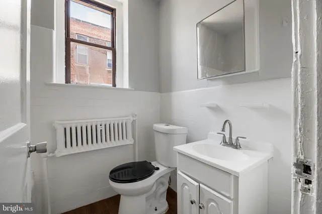 a view of a brick building with many windows