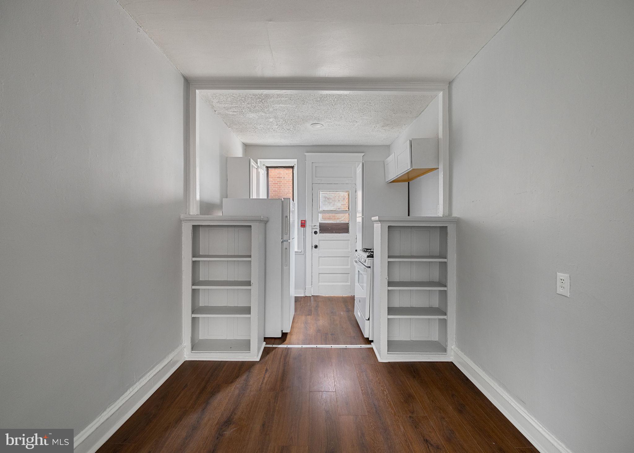 0 Garrett Road, Unit F101 Upper Darby, PA 19082 - Photo 9 of 22 a view of walk in closet with empty racks