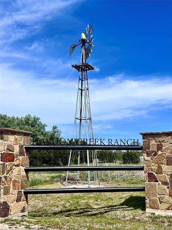 100 Haydon Crk Road Weatherford, TX 76087 - Photo 1 of 3 a view of a swimming pool with a lake view