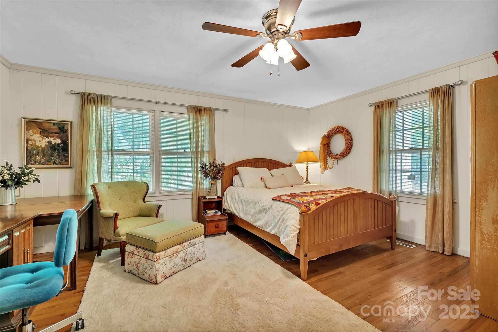 7 Hearthstone Lane Landrum, SC 29356 - Photo 12 of 43 a bedroom with a bed and glass window