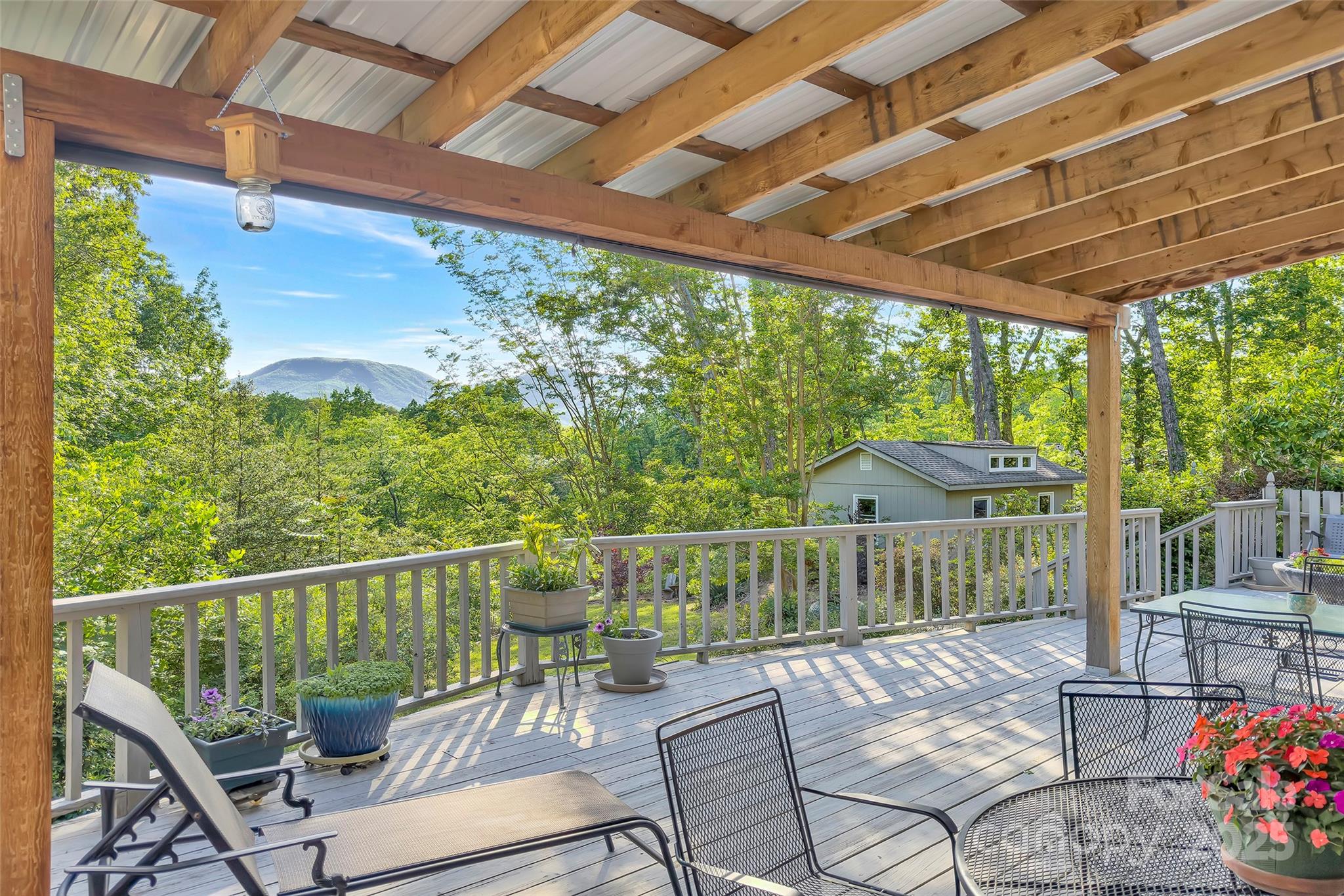 7 Hearthstone Lane Landrum, SC 29356 - Photo 21 of 43 a view of a chair and tables in the balcony