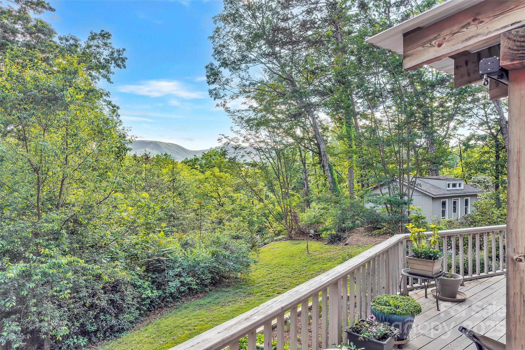 7 Hearthstone Lane Landrum, SC 29356 - Photo 23 of 43 a view of a two chairs and table in the balcony