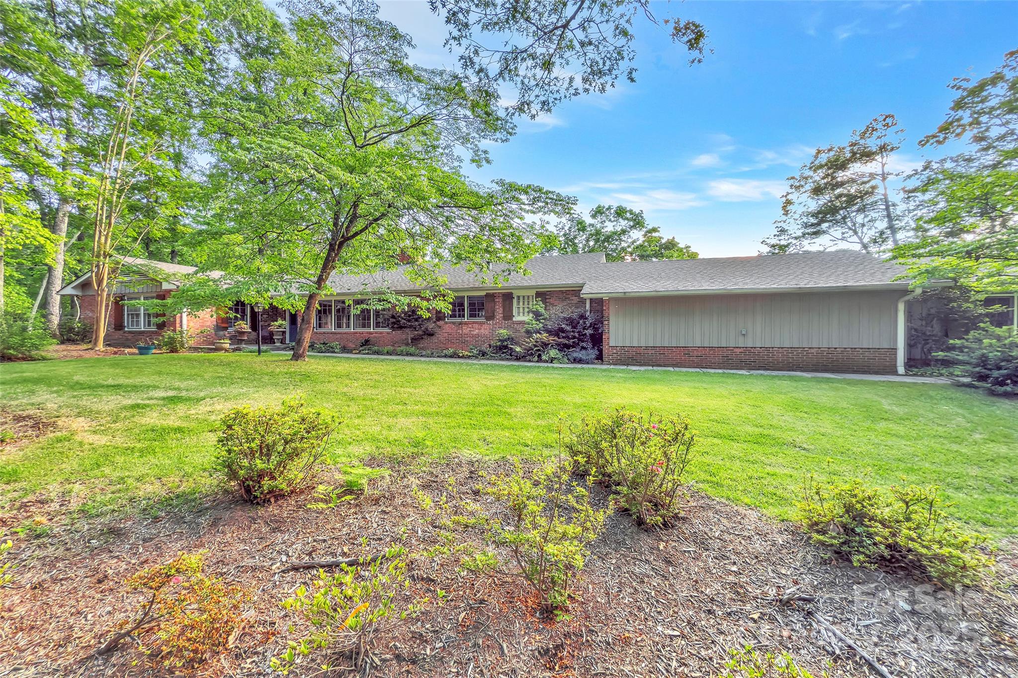 7 Hearthstone Lane Landrum, SC 29356 - Photo 24 of 43 a view of a house with a yard