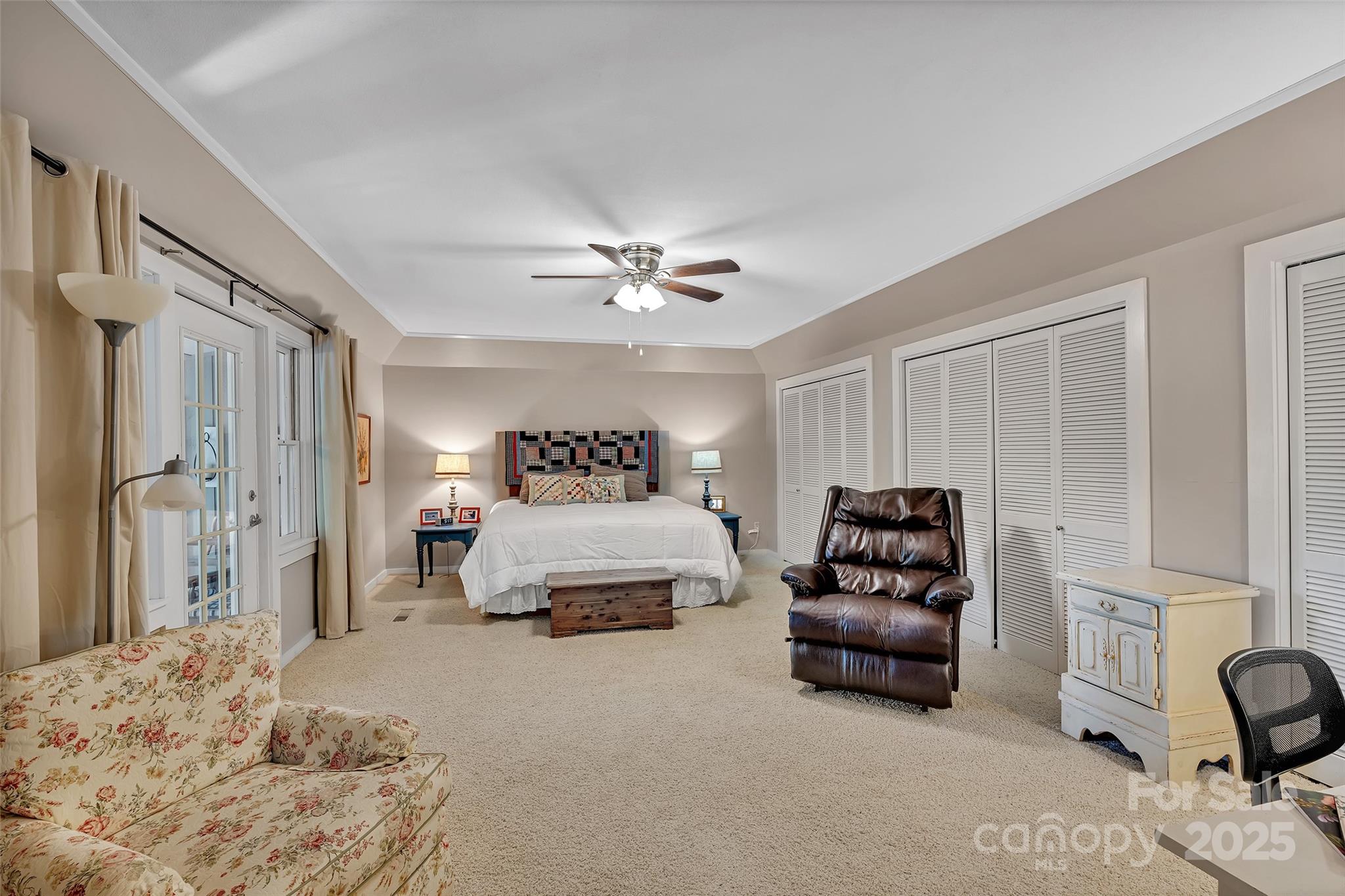 7 Hearthstone Lane Landrum, SC 29356 - Photo 3 of 43 a bedroom with a bed couch and dresser