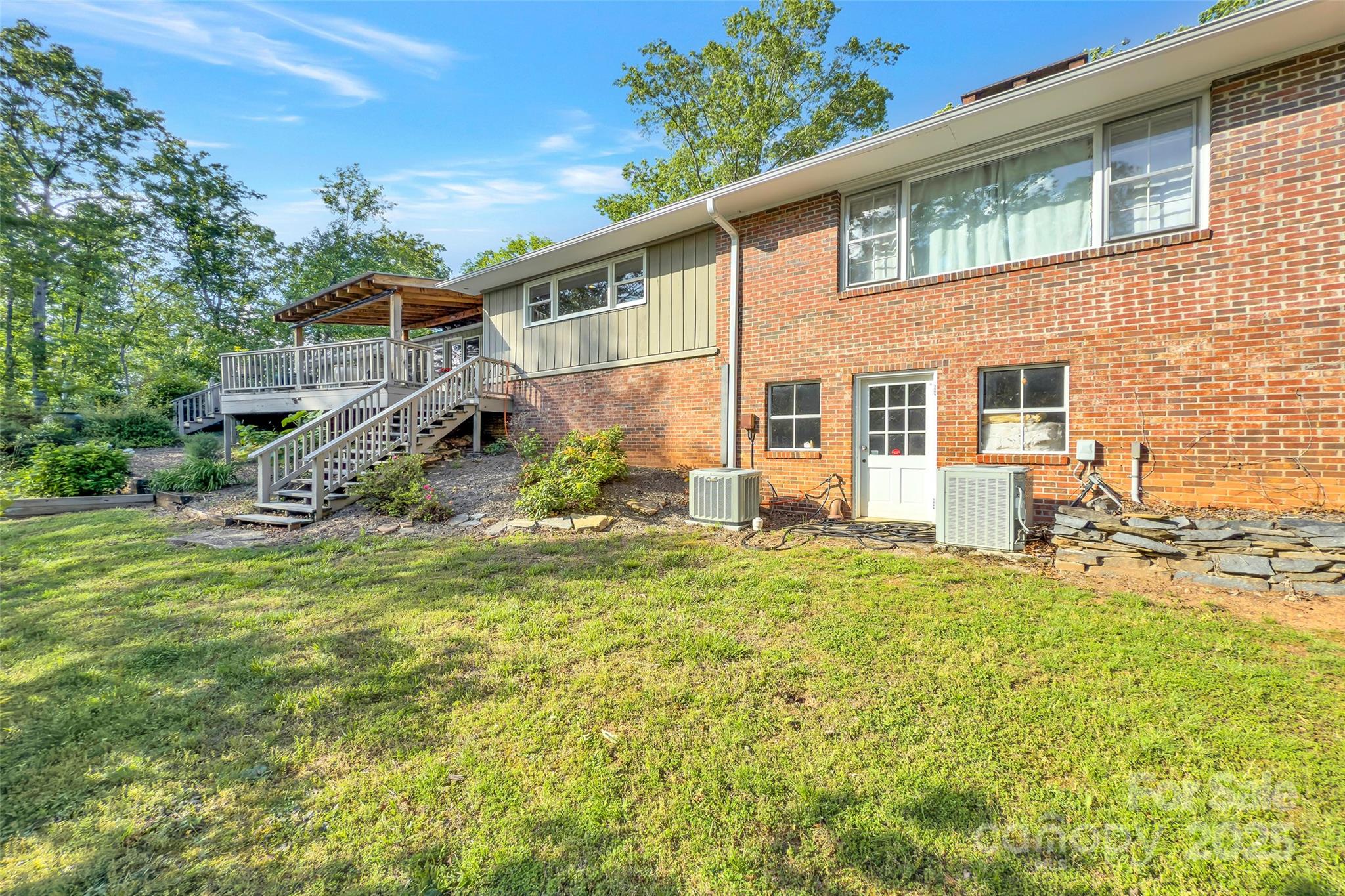 7 Hearthstone Lane Landrum, SC 29356 - Photo 37 of 43 a view of a house with a yard