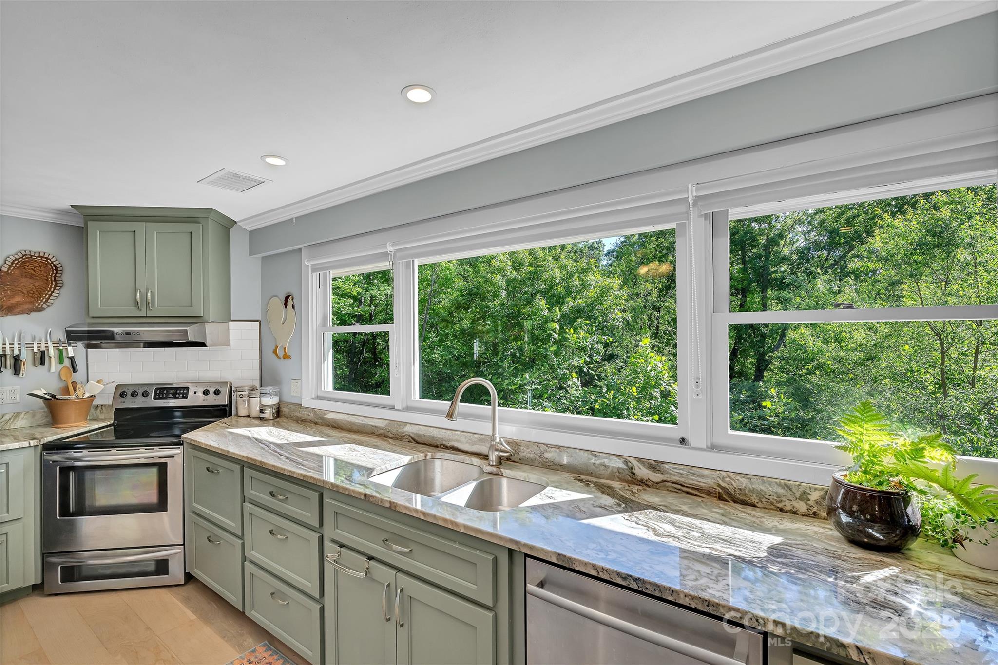 7 Hearthstone Lane Landrum, SC 29356 - Photo 5 of 43 a kitchen with a sink and a large window