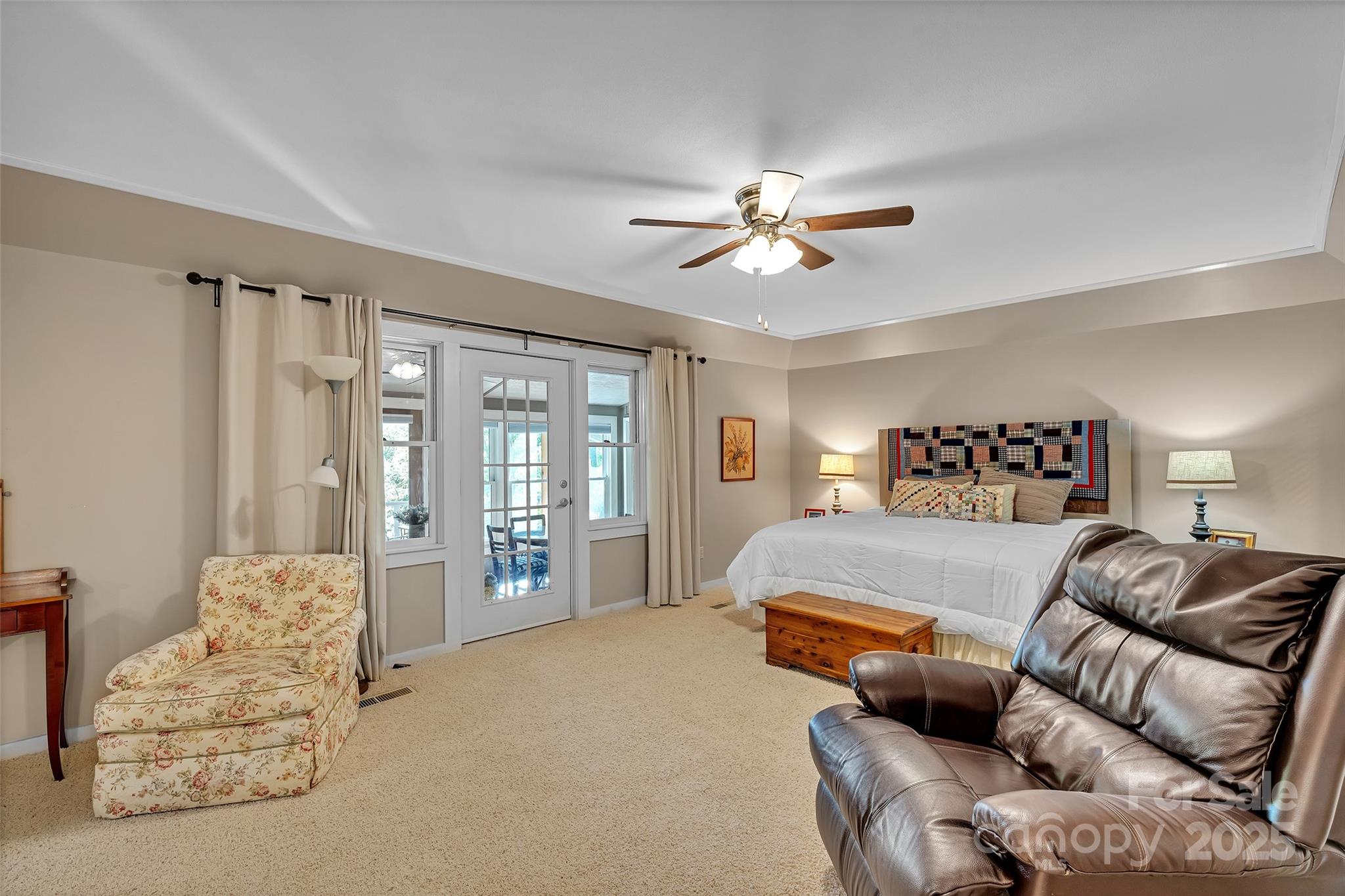 7 Hearthstone Lane Landrum, SC 29356 - Photo 6 of 43 a spacious bedroom with a bed furniture and a large window