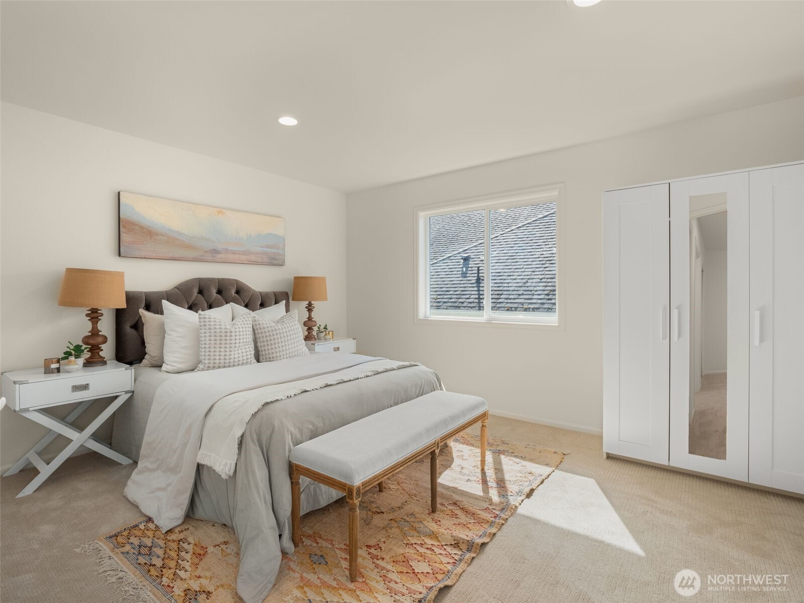 1206 South 36th Place Renton, WA 98055 - Photo 29 of 37 a bedroom with a bed and a painting on the wall