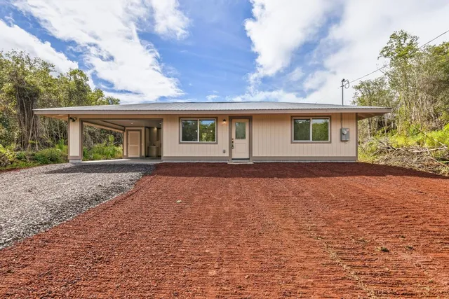 front view of house with a yard
