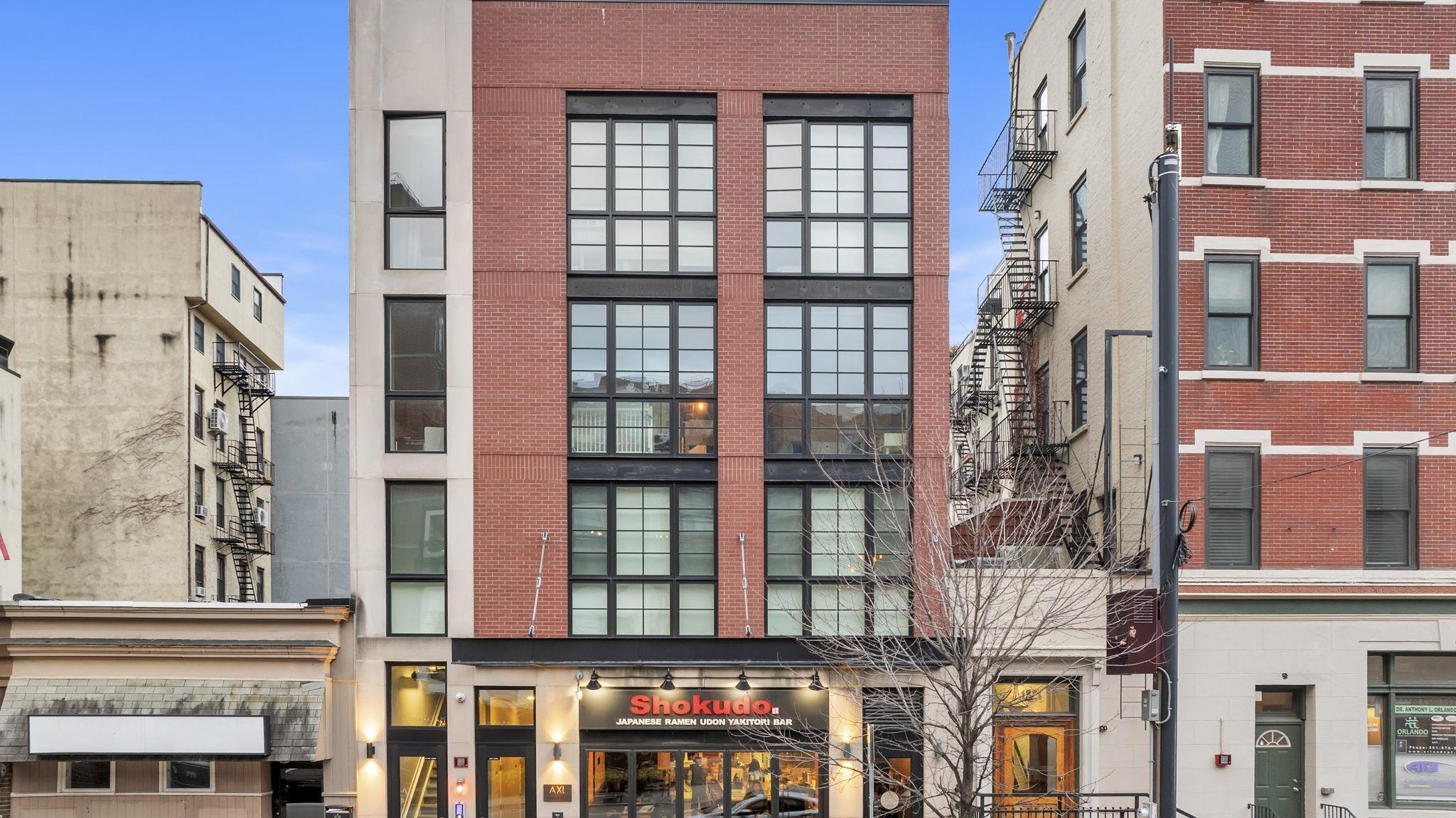 61 14th Street, Unit 3 Hoboken, NJ 07030 - Photo 26 of 31 front view of a building and a street