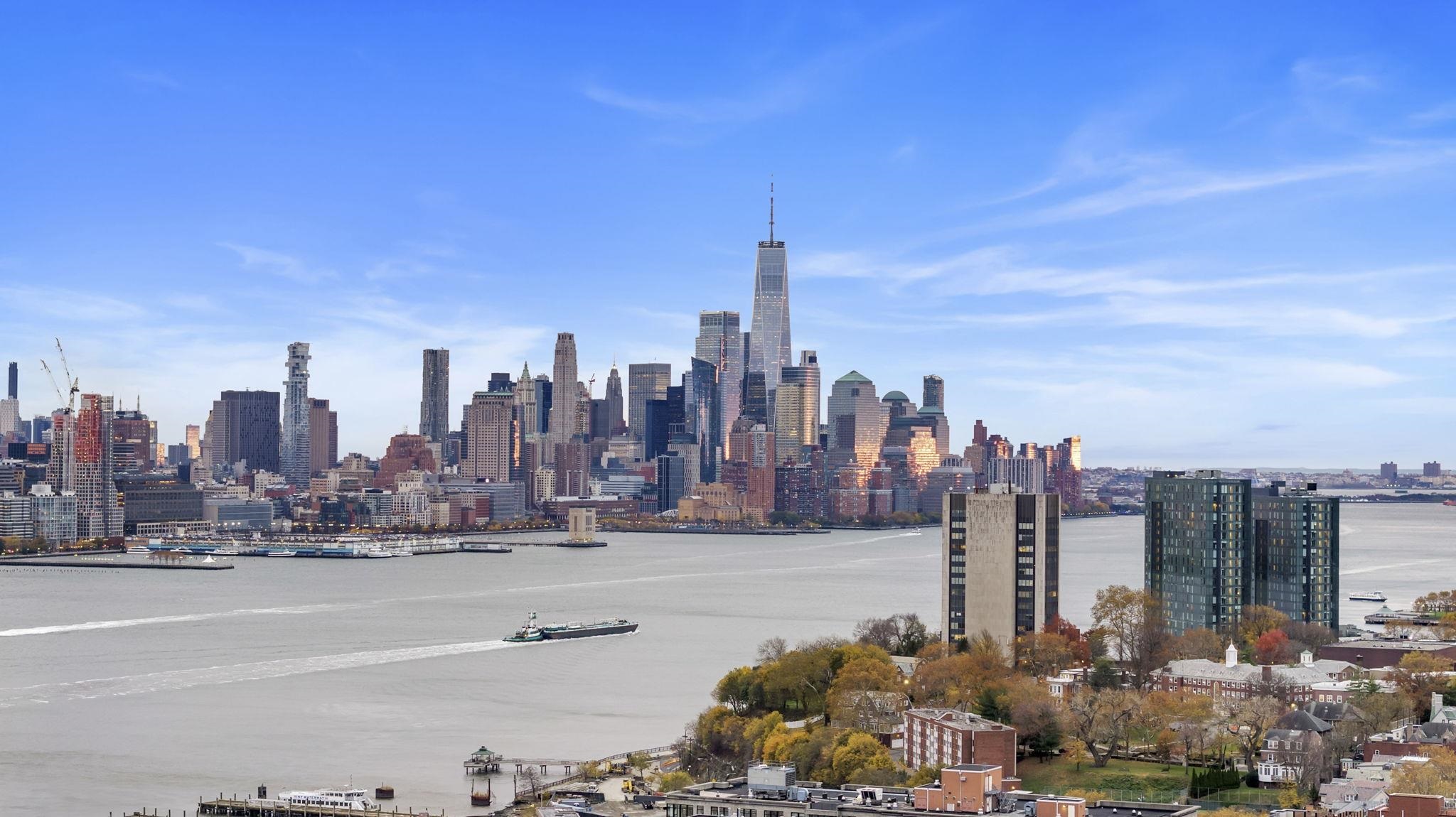 61 14th Street, Unit 3 Hoboken, NJ 07030 - Photo 27 of 31 a view of a city with tall buildings