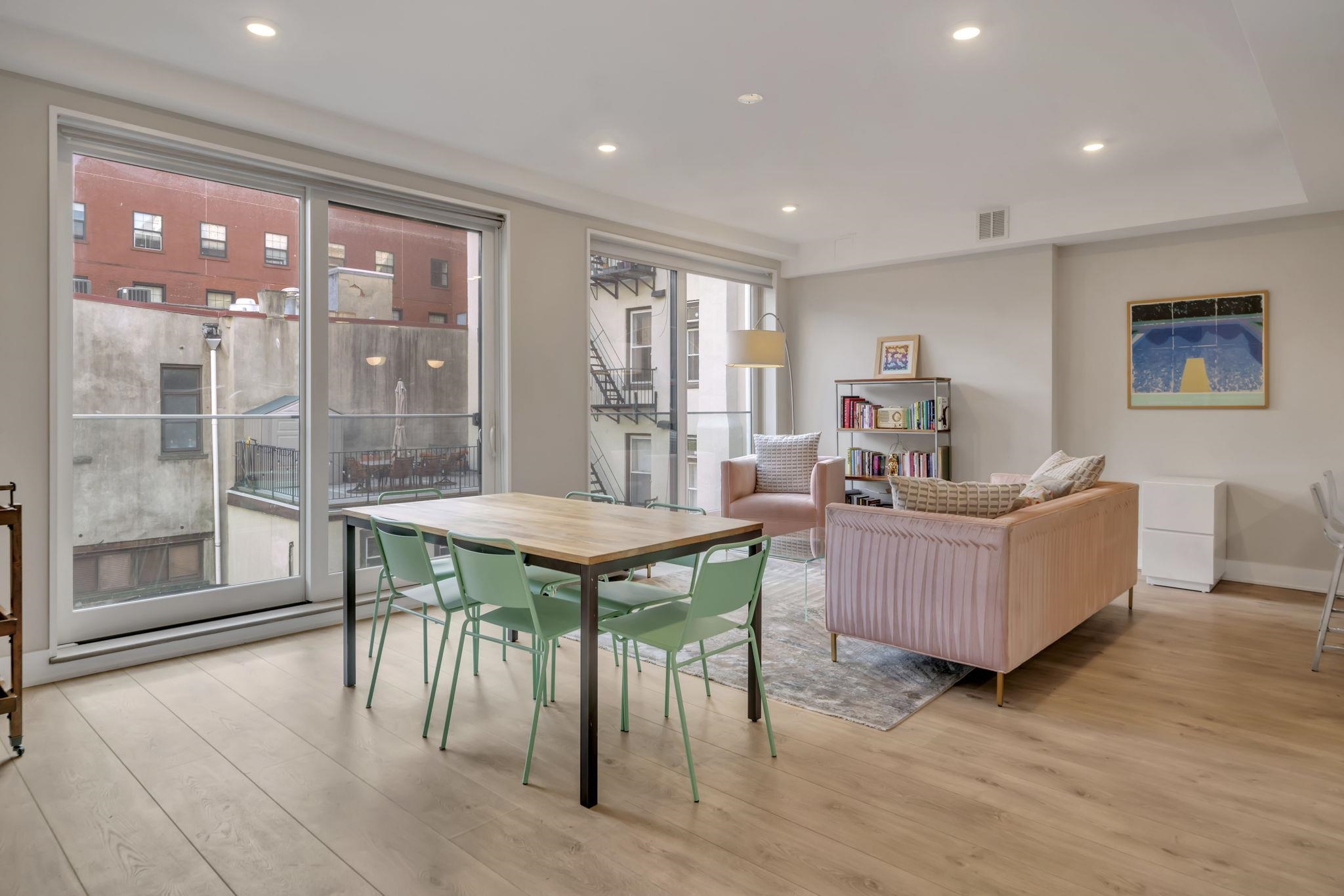 61 14th Street, Unit 3 Hoboken, NJ 07030 - Photo 5 of 31 a dining room with furniture and wooden floor